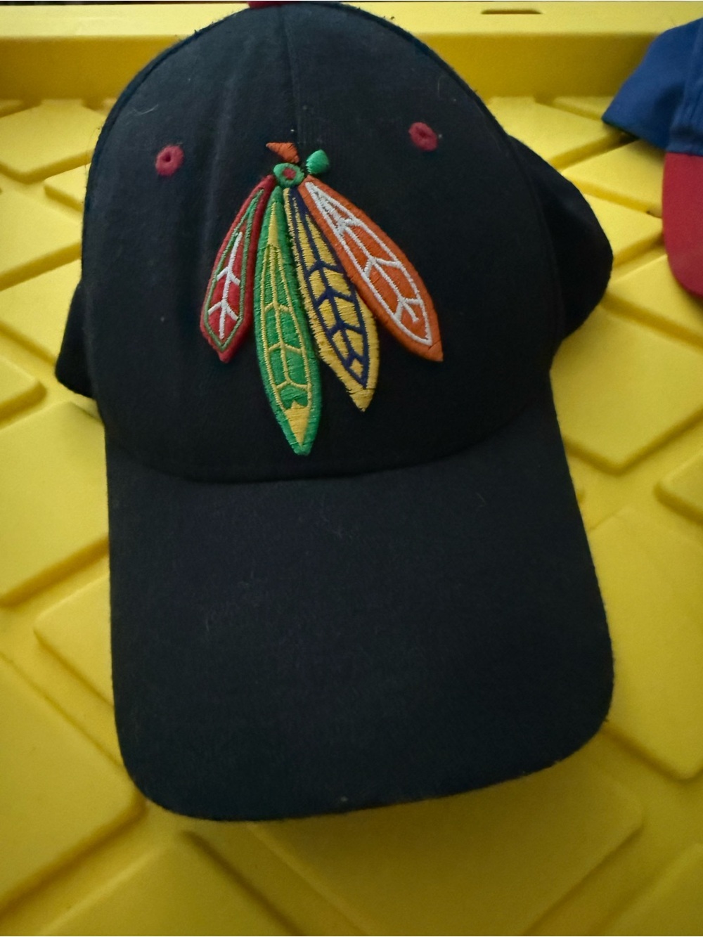 NHL Black Cap with Multicolor Feather Patch